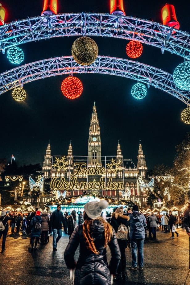 girl standing at entrance of Christmas Market in Vienna
