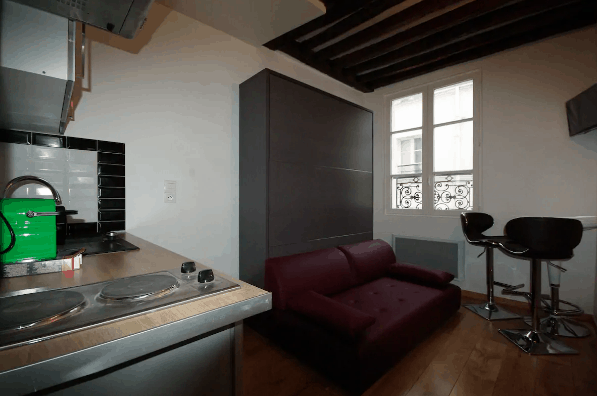 living room and kitchen in Airbnb in Paris