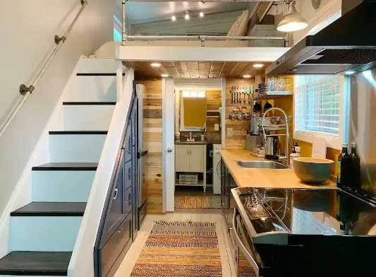 stairs and kitchen in Tiny house in Austin, Texas