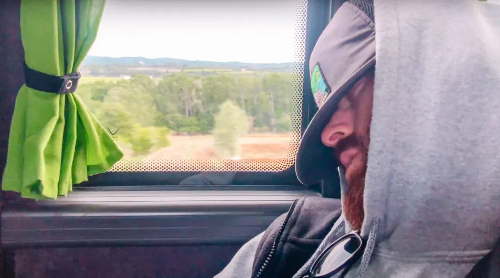 man sleeping on a Flixbus